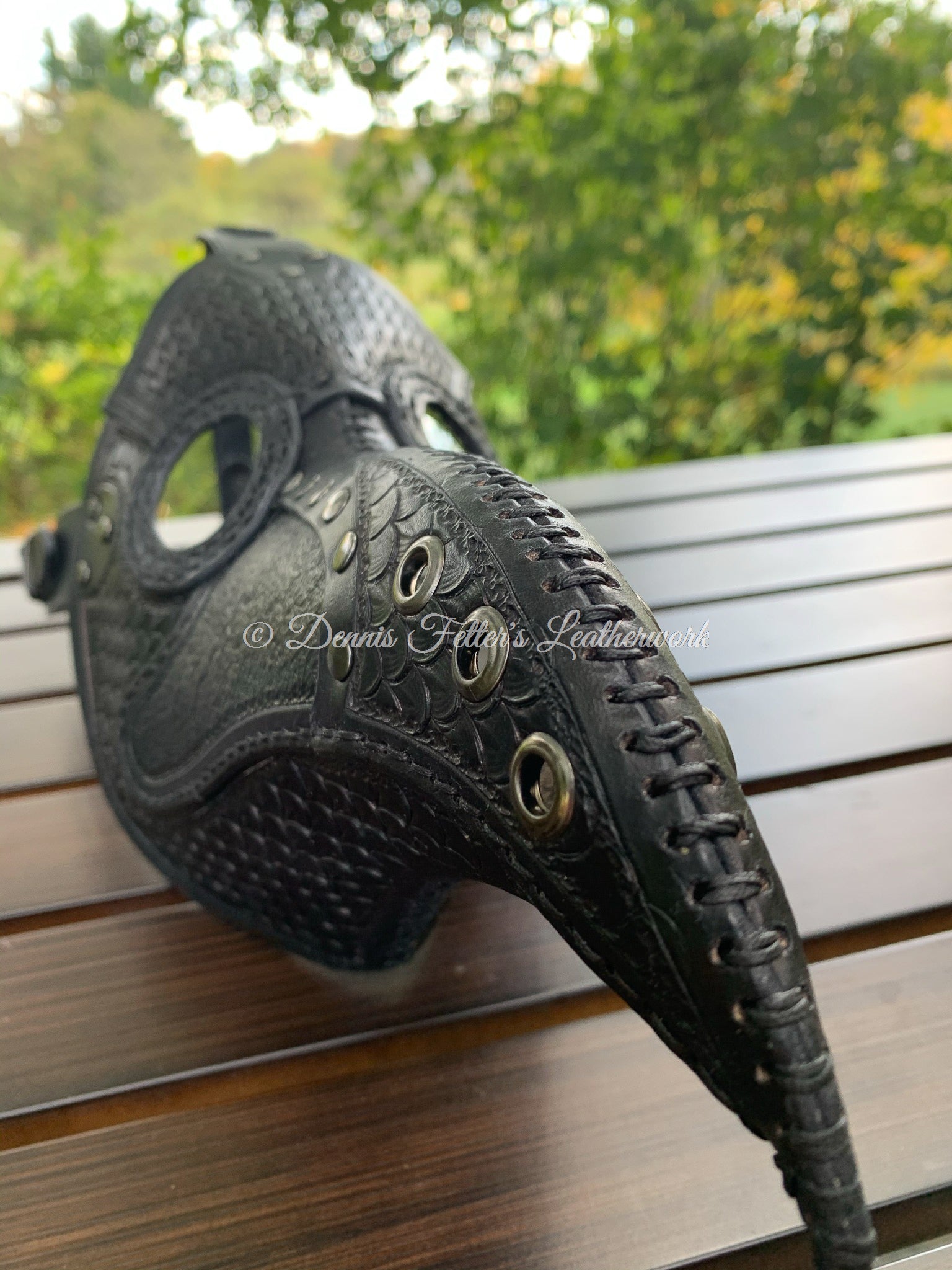 leather plague doctor mask stamped - black - front view angled from side