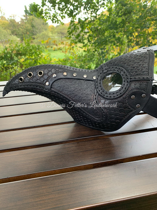 leather plague doctor mask stamped - black in color - side view