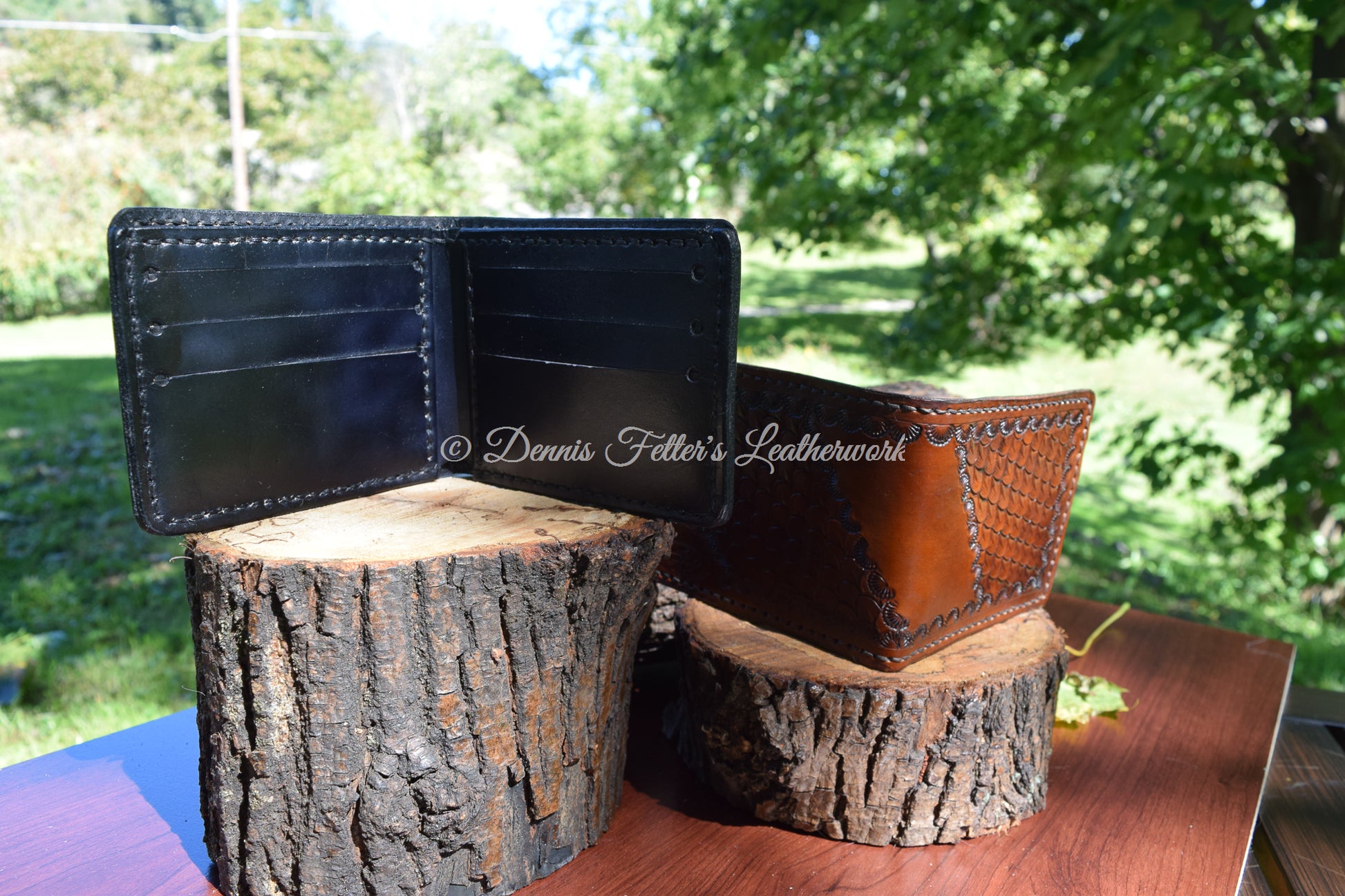 inside pocket view of black leather wallet, outside view of brown leather wallet and stamping
