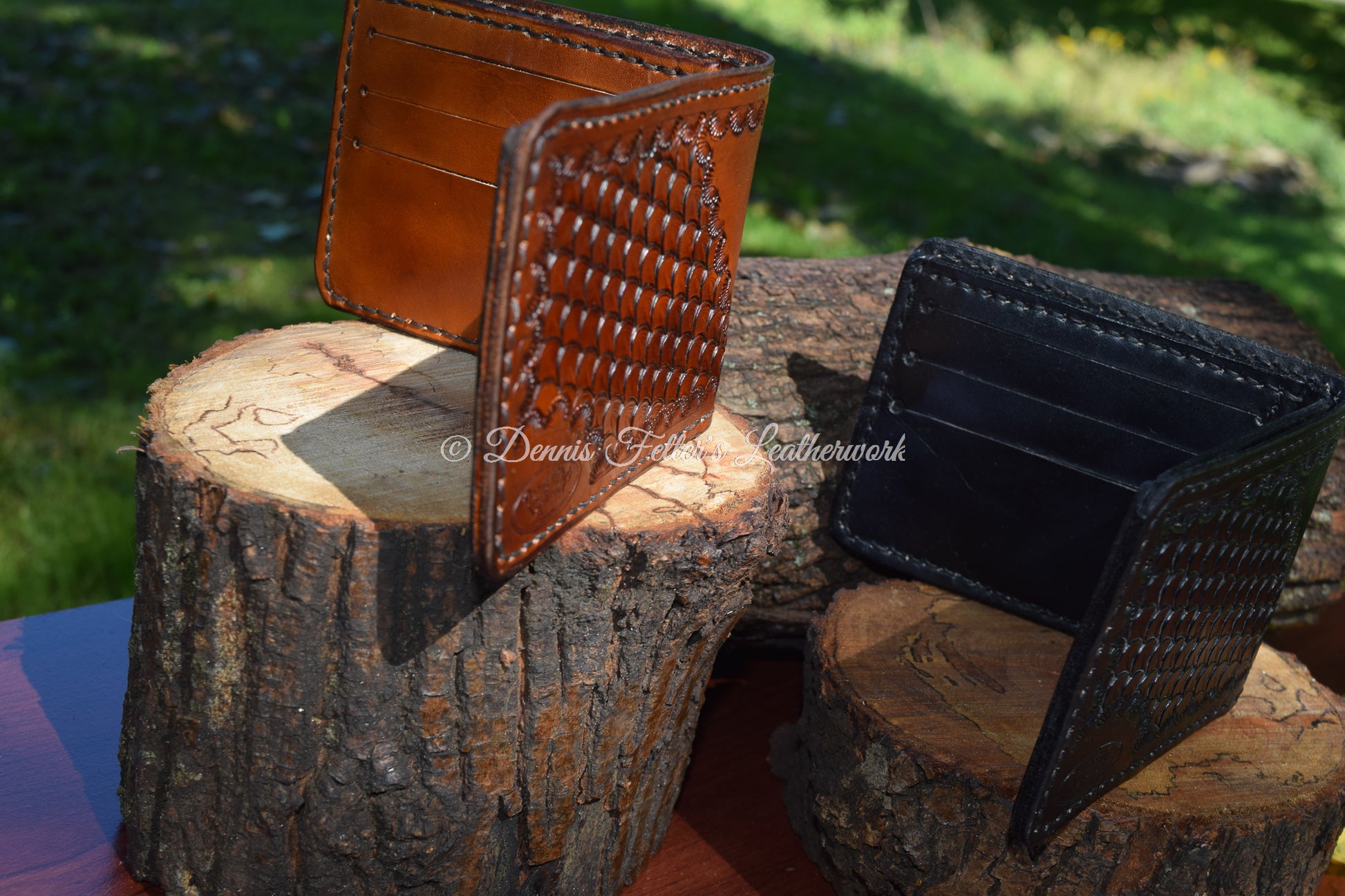 view of both black and brown leather wallet showing inner pockets and exterior stamping