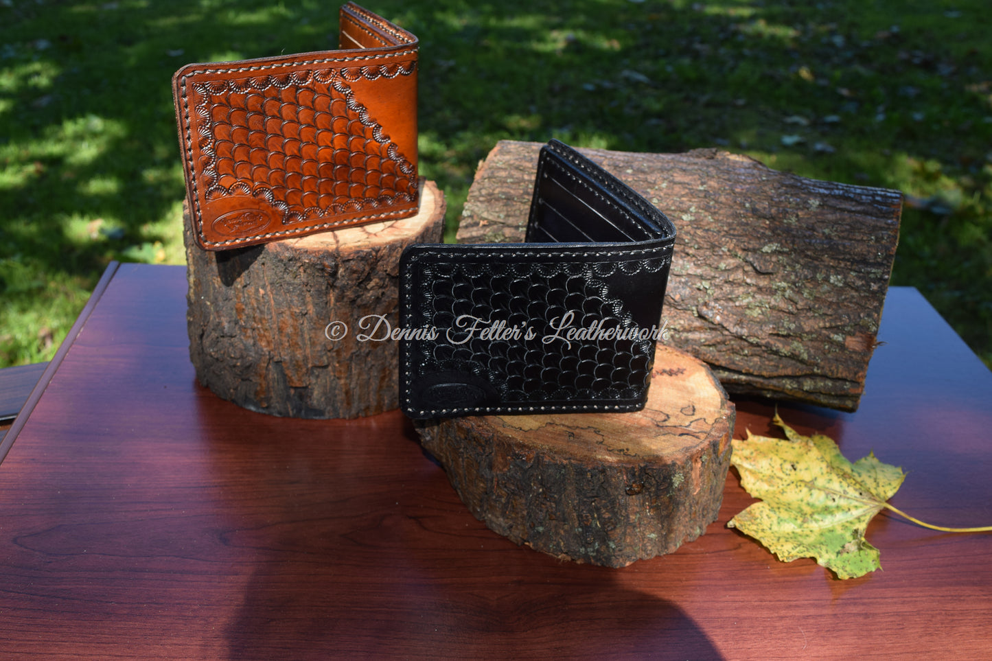 black and brown leather wallets showing even more of the exterior stamping